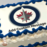 Winnipeg Jets logo with a stylized jet and maple leaf, encircled by navy blue and grey, printed on a sheet cake.