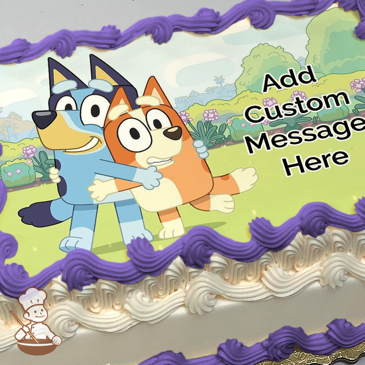 Cartoon illustration of Bluey and Bingo, two dog characters, hugging and smiling in a park setting, printed on a sheet cake.