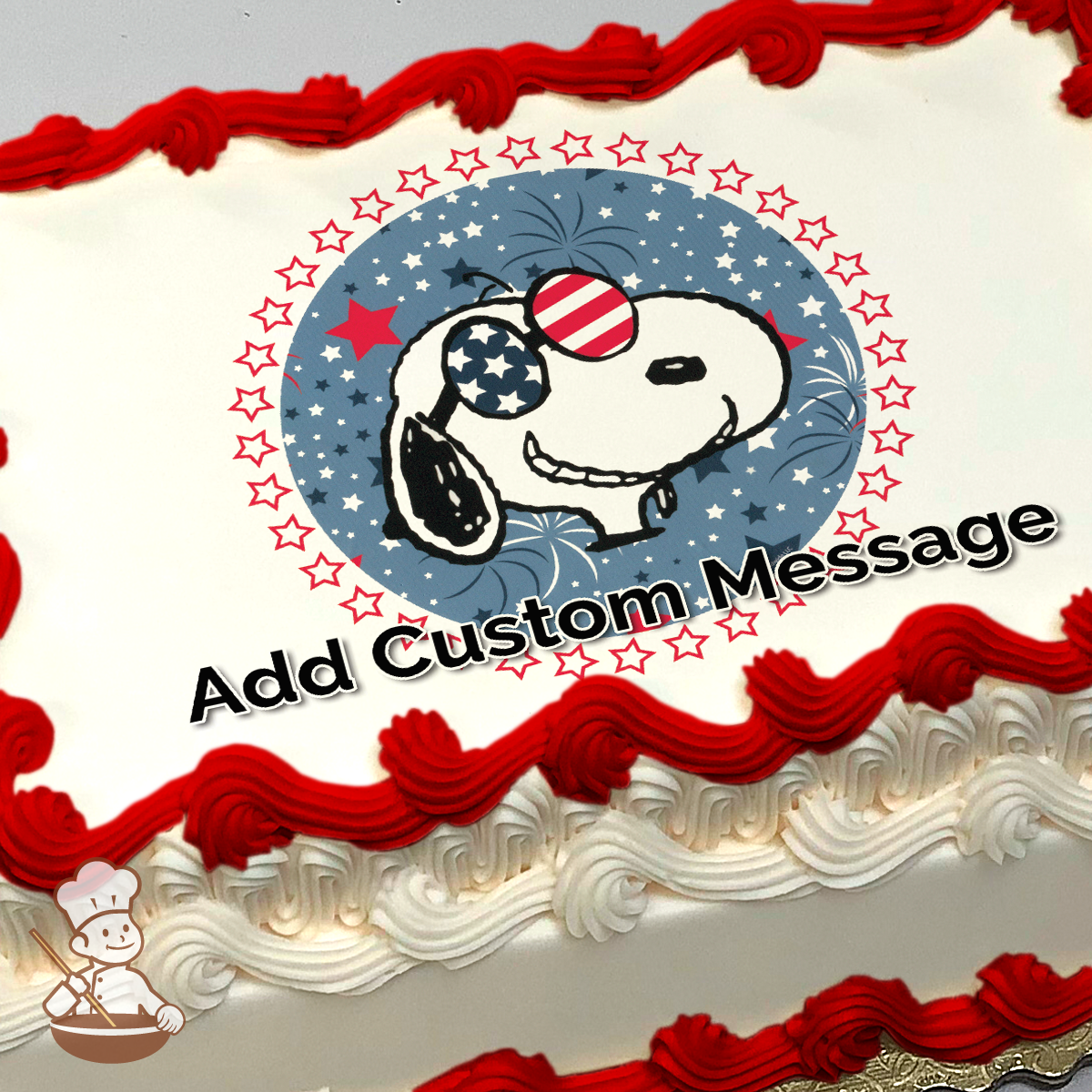 Illustration of Snoopy wearing patriotic sunglasses, against a blue background with fireworks and stars, printed on a sheet cake.