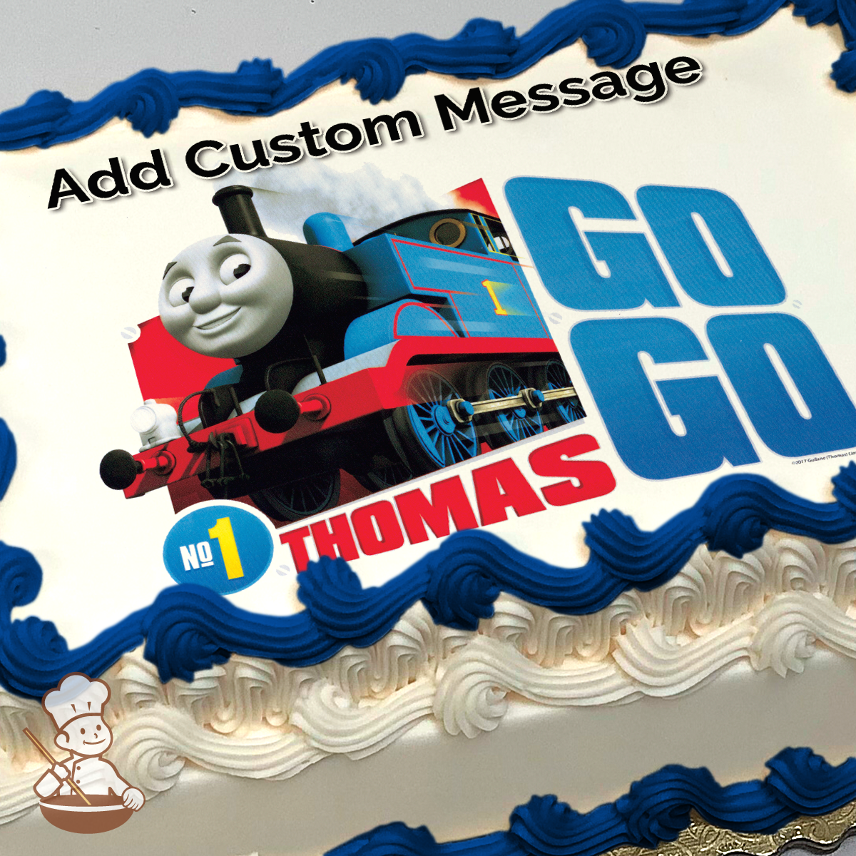 Illustration of Thomas the Tank Engine with a bright smile, set against a cloudy sky, with the text "GO GO THOMAS" printed on a sheet cake.