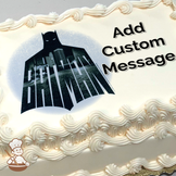 Batman logo with a cityscape silhouette, printed on a sheet cake.