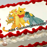 Winnie the Pooh with Tigger and Eeyore, all smiling, on a sheet cake.