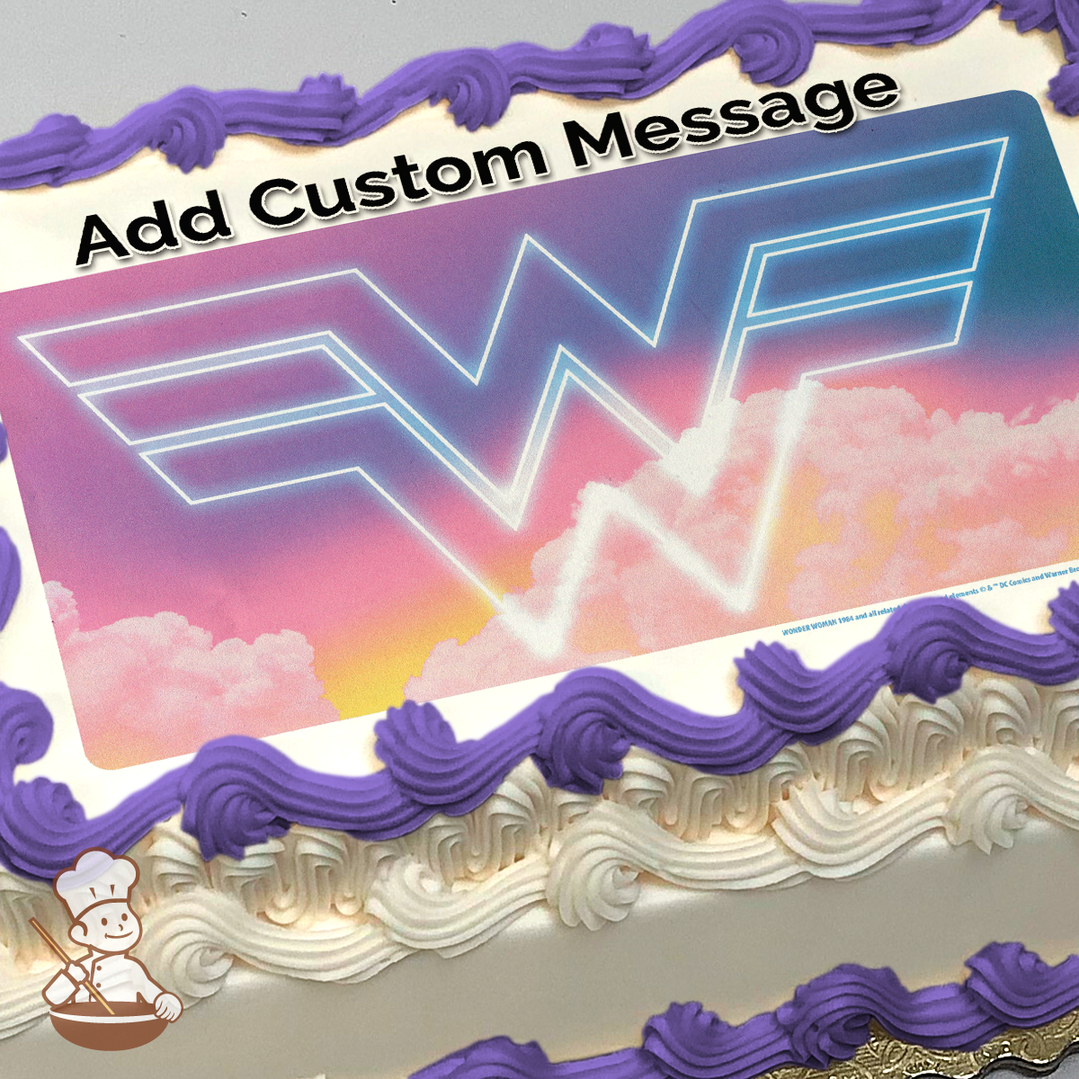 Retro-style Wonder Woman logo with neon outline against a pastel cloud background, printed on a sheet cake.