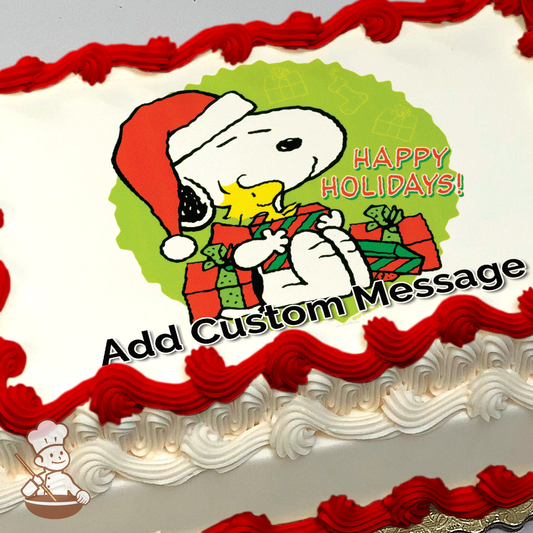 Cartoon of Snoopy in a Santa hat sitting in a pile of presents, hugging a box containing Woodstock, printed on a sheet cake.