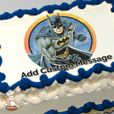 Batman in a dynamic pose with a stylized cityscape background, printed on a sheet cake.