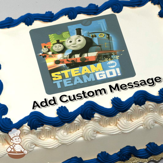 Illustration of Thomas the Tank Engine with Percy and James on a railway track, with "STEAM TEAM GO!" text, printed on a sheet cake.