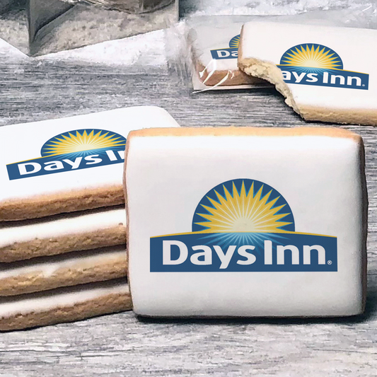 A stack of rectangle butter shortbread cookies with Days Inn logo printed directly on a white, lemon sugar icing.